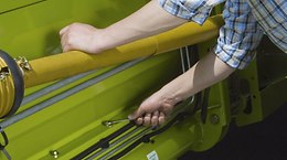 Racleurs réglables de l'extérieur (C 490, C 430, 
C 370) - Outils frontaux