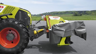 Grâce à l'articulation en pied de lamier, la faucheuse DISCO PROFIL suit le sol et non le tracteur. -